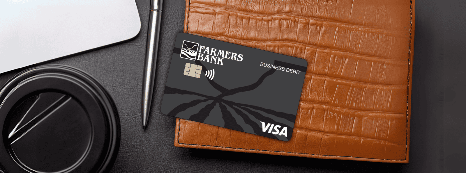 Farmers Bank Business check on a cluttered business desk