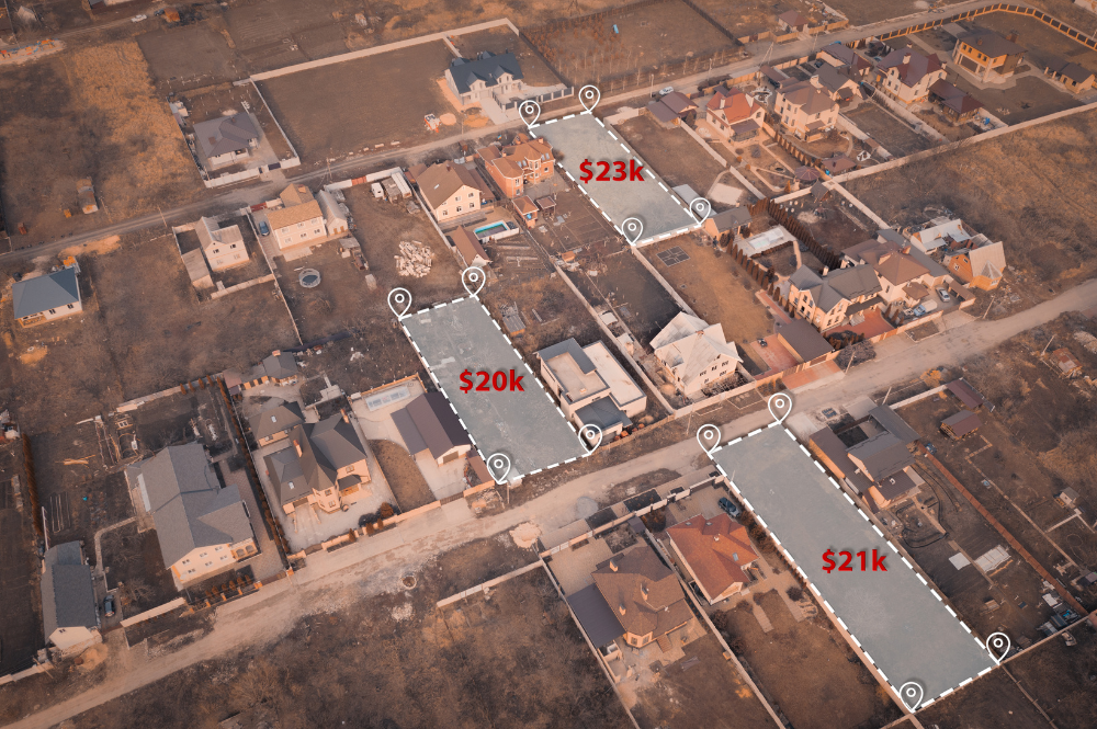 Aerial view of residential area with houses and lots for sale