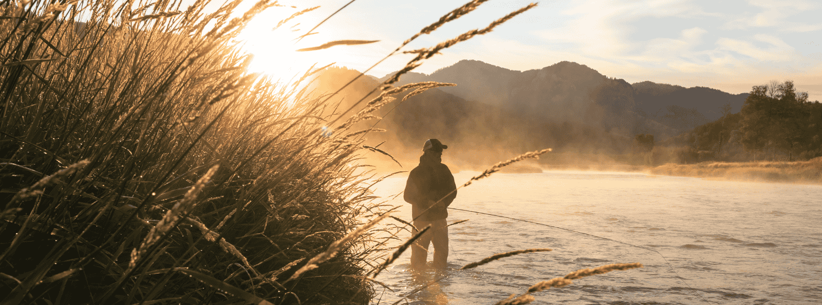 Man fly fishing on Snake River