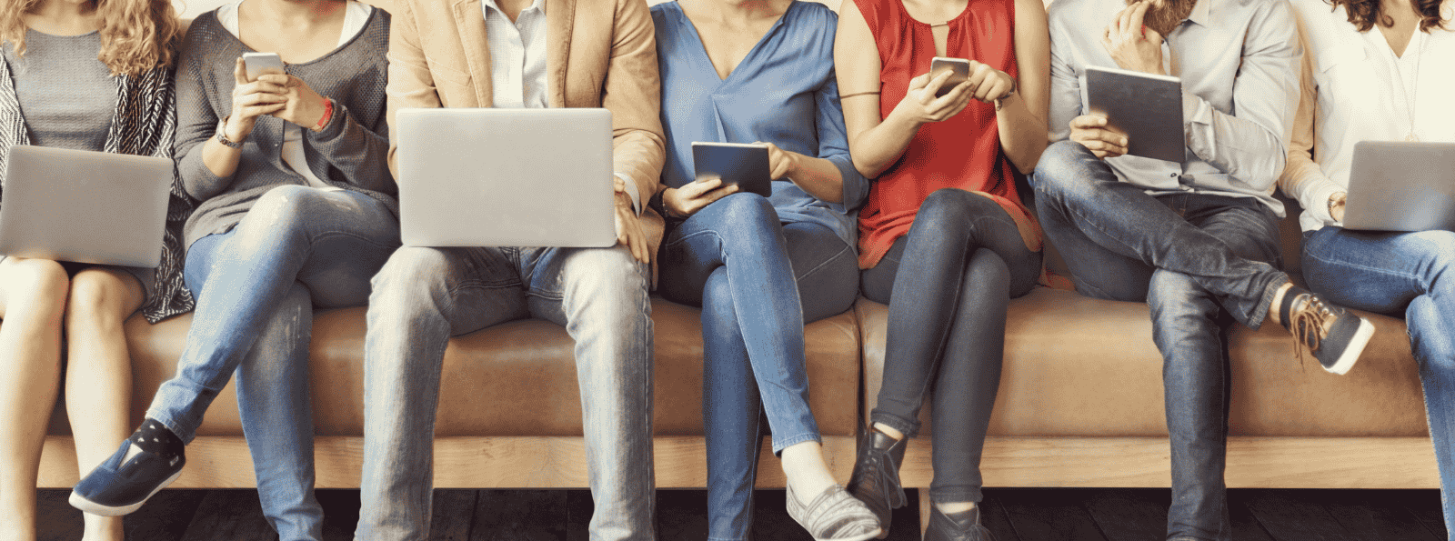 Group of people on their mobile device, tablet or laptop